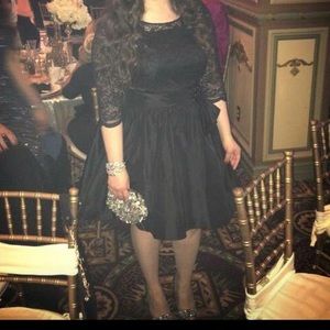Short black fancy dress with lace